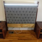 Image of a semi-finished tufted headboard w/ night stands. It includes integrated outlets, LED, dimmable lighting and selft-supporting structure.